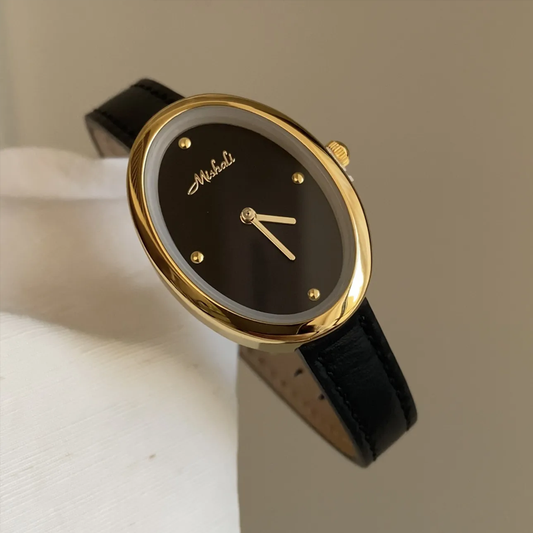 Vintage Gold Timepiece: Black Leather Oval Quartz Watch