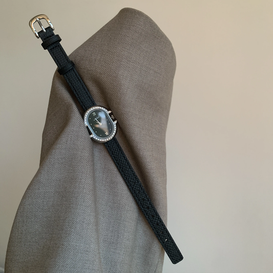 Onyx Silver Timepiece: Black Oval Quartz Watch