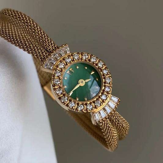 Regal Emerald Timepiece: Gold and Green Watch