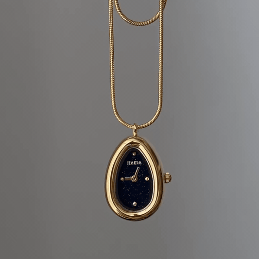 Artful Elegance – Women’s Black Teardrop Pendant Watch with Snake Chain Design