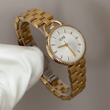 Timeless Elegance: White Round Dial Gold Stainless Steel Quartz Watch