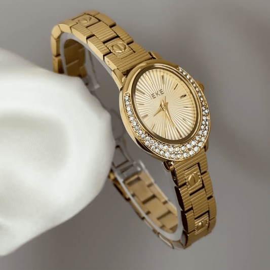 Luxurious Sparkle: Gold Oval Dial Watch with Gold Diamond Bezel & Gold Stainless Steel Bracelet