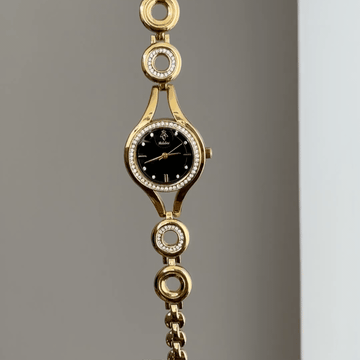Daily Luxury: Black Round Dial Watch with Gold Diamond Bezel & Gold Chain Bracelet