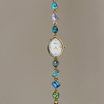 Rainbow Radiance：White Almond-Shaped Dial Watch with Gold Bezel & Multi-Color Crystal-Studded Stainless Steel Bracelet
