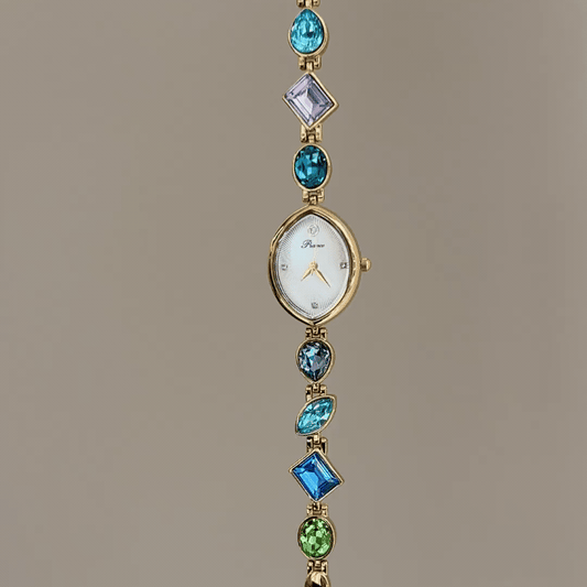 Rainbow Radiance：White Almond-Shaped Dial Watch with Gold Bezel & Multi-Color Crystal-Studded Stainless Steel Bracelet