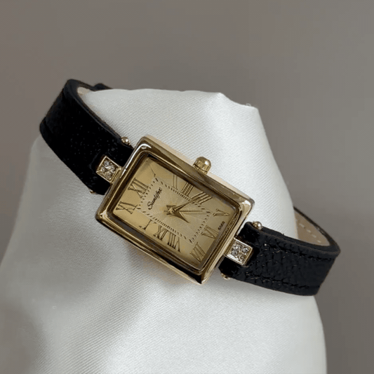 Vintage Gold Tank Watch with Champagne Roman Numeral Dial & Black Leather Strap