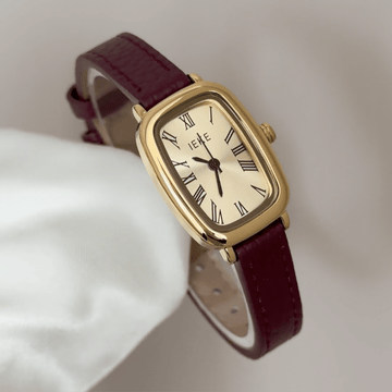 Warm Luxury: Gold Rectangular Dial Watch with Matching Bezel & Red Genuine Leather Strap