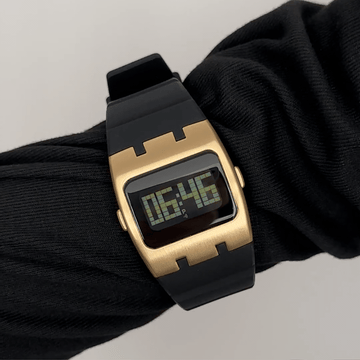 Tech Chic: Black Rectangular Digital Display Watch with Gold Bezel & Black Silicone Strap