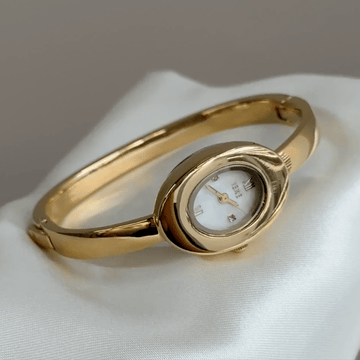 Vintage Petite Gold Oval Bangle Watch with Mother-of-Pearl Dial