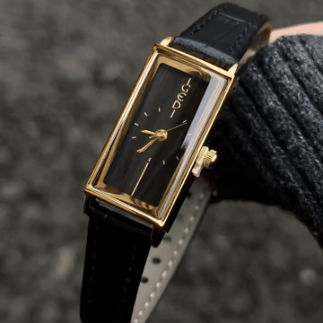 Vintage Elongated Gold Tank Watch with Minimalist Black Dial & Leather Strap