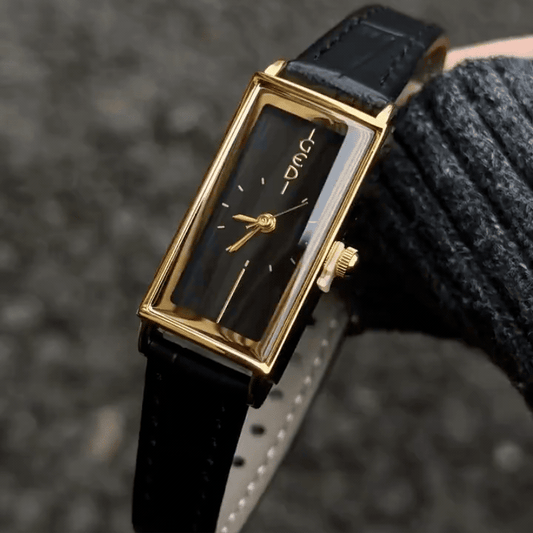 Vintage Elongated Gold Tank Watch with Minimalist Black Dial & Leather Strap
