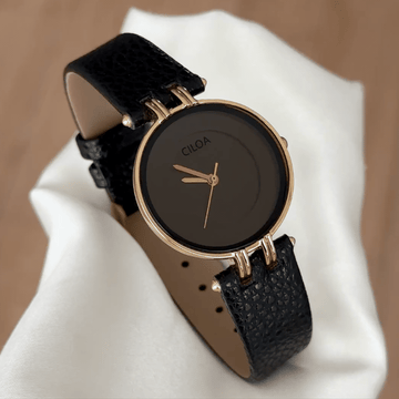 Timeless Contrast: Black Round Dial Watch with Gold Bezel & Black Leather Strap