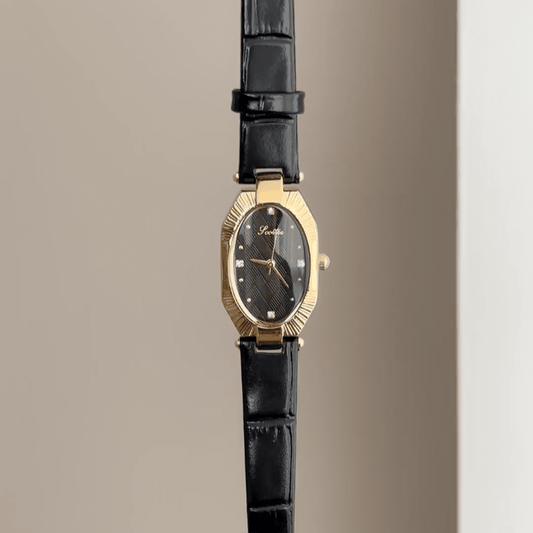 Oval Elegance: Black Oval Dial Watch with Gold Oval Bezel & Black Genuine Leather Strap