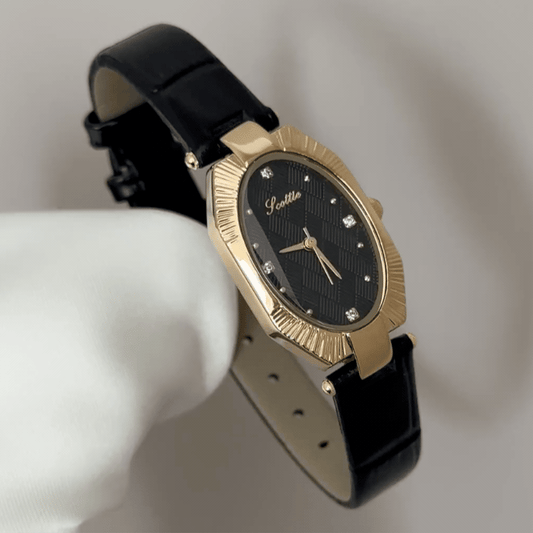 Oval Elegance: Black Oval Dial Watch with Gold Oval Bezel & Black Genuine Leather Strap
