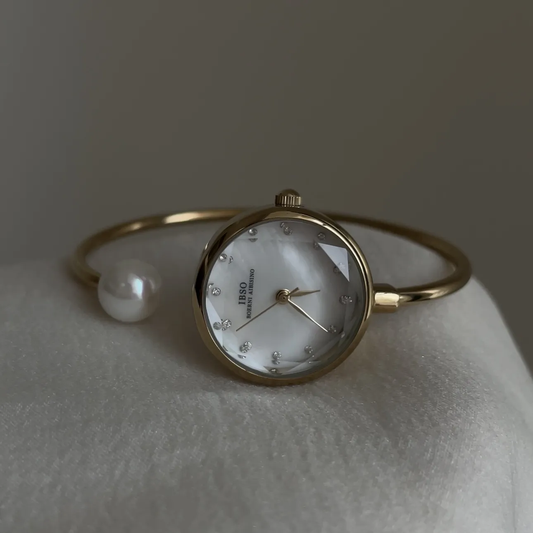 French Pearl Timepiece: Luxe Gold Bangle Quartz Watch