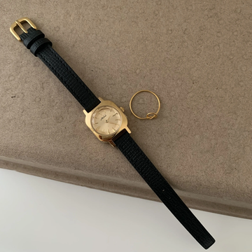 Montre Onyx Luxe : Montre à quartz en cuir noir et doré