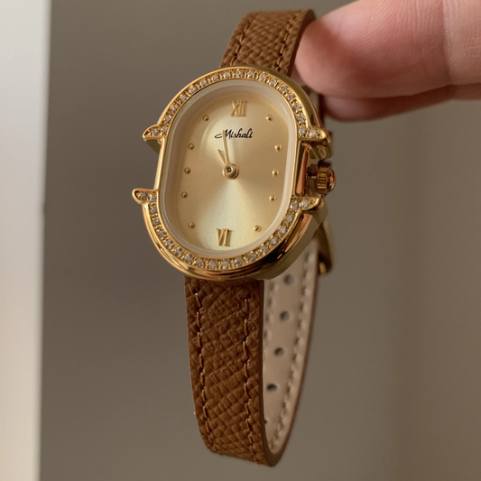 Golden Elegance Timepiece: Brown Leather Oval Quartz Watch