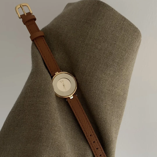 Amber Glow Timepiece: Brown Leather & Glass Dial Watch