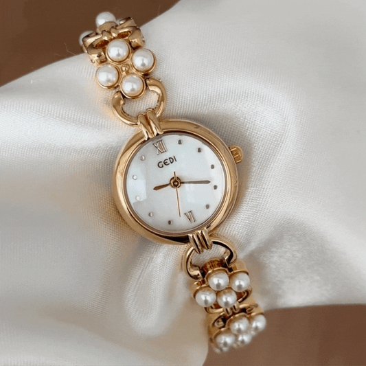 Radiant Brilliance White Oval Mother-of-Pearl Dial Gold Diamond Watch