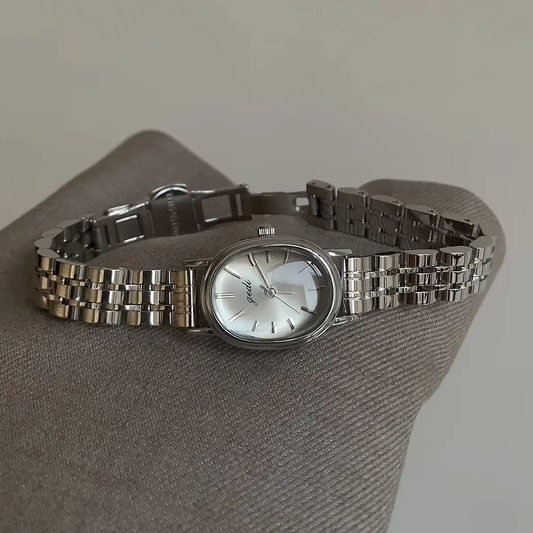 Elegant Oval Dial Quartz Watch for Women – Silver Strap, Versatile & Refined