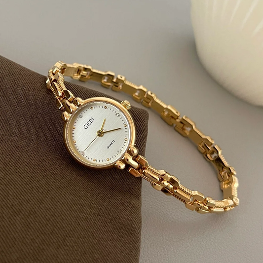 Vintage Luxe: White Dial Gold Chain Quartz Watch