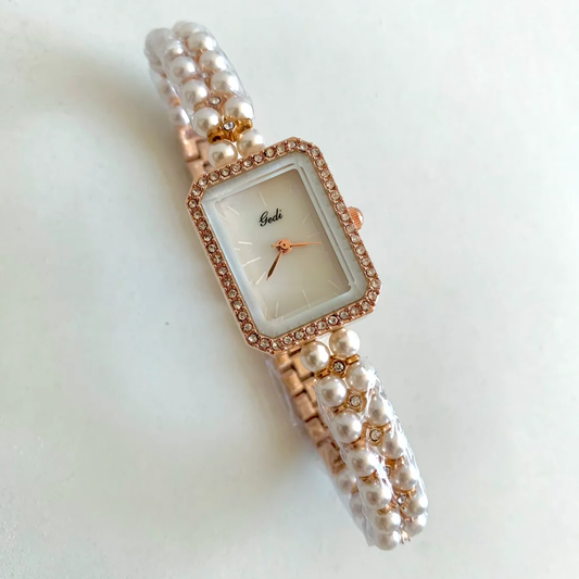 Chanel Charm Timepiece: Gold Pearl Chain Mini Watch