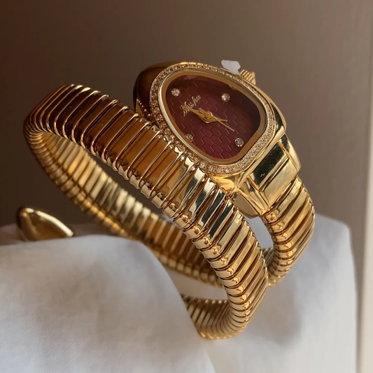 Golden Serpent Timepiece: Red Dial Diamond-Studded Bracelet Watch