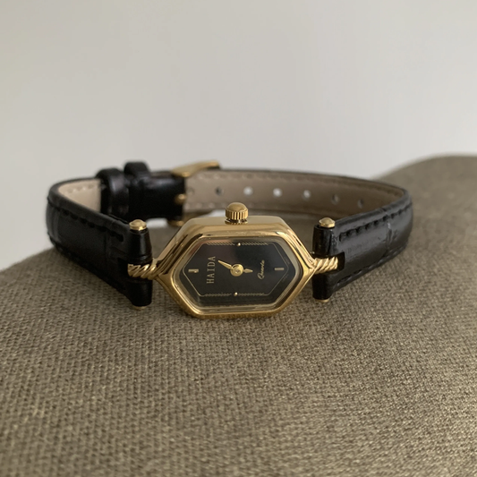 Vintage Gold Timepiece: Black Leather & Gold Case Quartz Watch