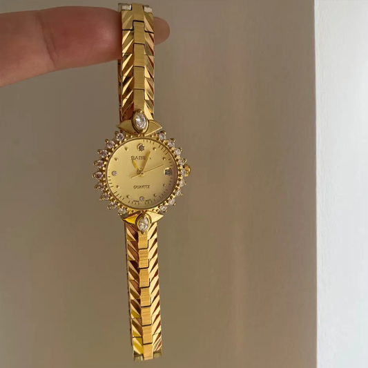 Regal Glow Timepiece: Gold Chain Diamond Dial Watch