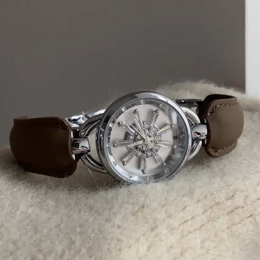 Snowfall Grace Timepiece: Elephant Grey Leather Rotating Snowflake Bracelet Watch