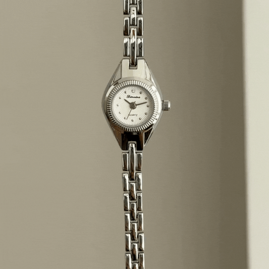 Daily Commute Silver Round Dial Alloy Bracelet-Style Quartz Watch