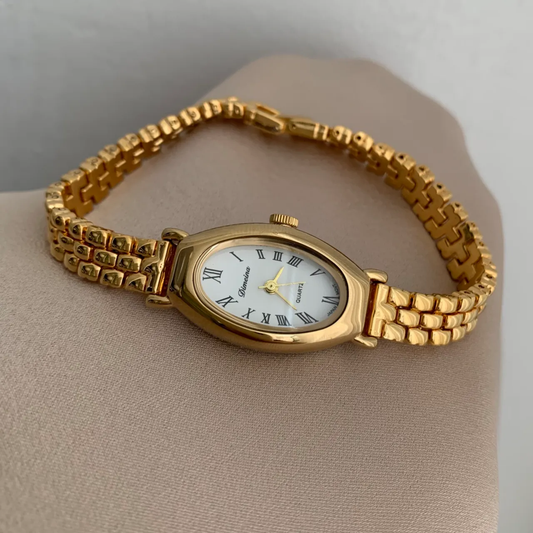 Elliptical Roman Timepiece: Luxe Vintage French Gold Watch