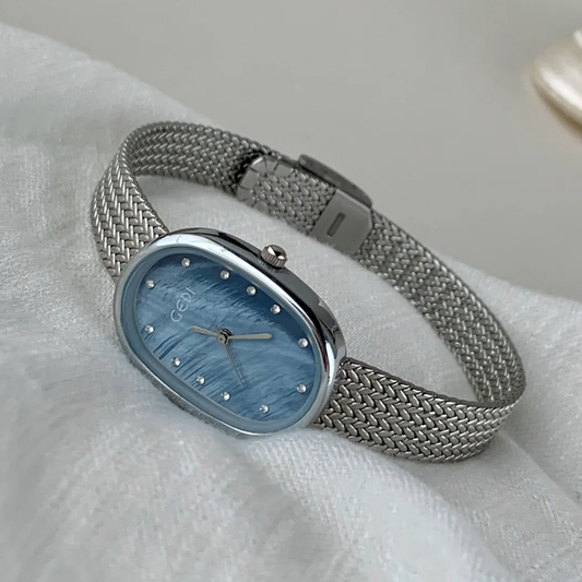 Azure Radiance Timepiece: Silver and Sky Blue Watch