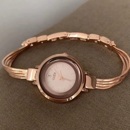 Rose Gold Elegance Timepiece: Tassel Chain Round Quartz Watch