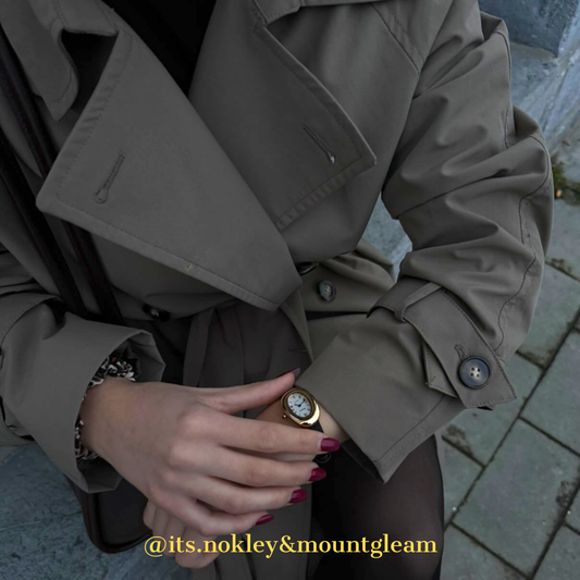 Golden Grace Wimepiece: dial de número romano ovalado con correa negra