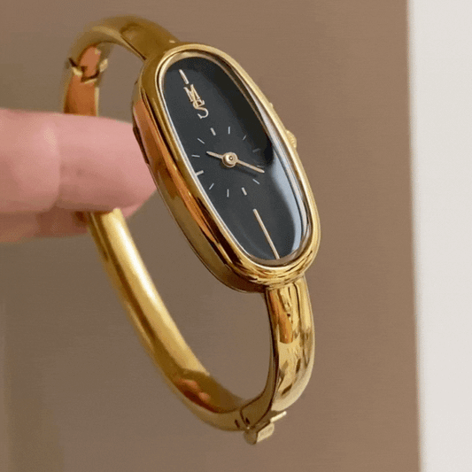 Gold Bangle Women’s Watch – Long Oval Black Dial | Elegant Quartz Design