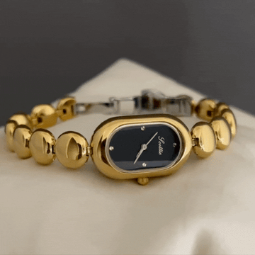 Gold Oval Black Dial Reloj de cuarzo con cuentas para mujeres - Elegante y atemporal