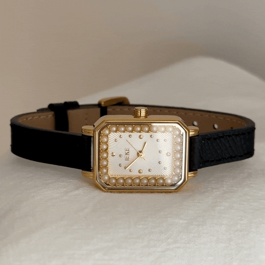 Noir Elegance – Black Leather Strap Women’s Quartz Watch with Gold Rectangular Case and Pearl Crystal Bezel