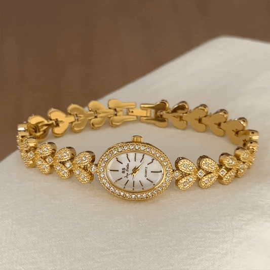 Aurélia Grain – Elegant Gold Wheat-Link Women’s Quartz Watch with Diamond-Accented Oval Dial Bracelet