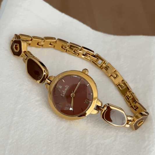 Amber Luxe – Elegant Gold Bracelet Women’s Quartz Watch with Brown Gemstone Inlays and Matching Round Dial