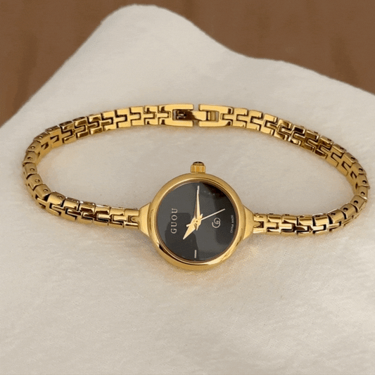 Minimal Elegance – Women’s Gold Slim Strap Black Small Round Quartz Watch