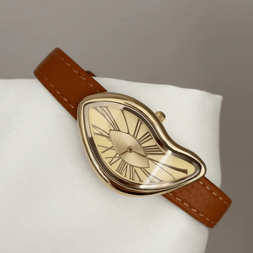 Avant-Garde Artistic: Gold Abstract Dial Watch with Orange Leather Strap