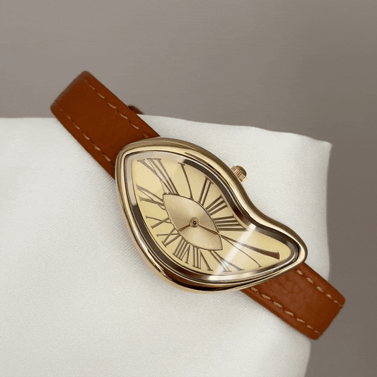 Avant-Garde Artistic: Gold Abstract Dial Watch with Orange Leather Strap
