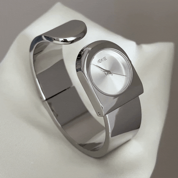 Minimalist Chic Elegant: White Round Dial Watch with Silver Stainless Steel Cuff Bracelet