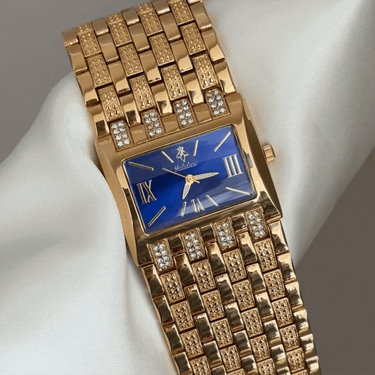 Modern Contrast: Navy Rectangle Dial with Wide Gold-Tone Bracelet
