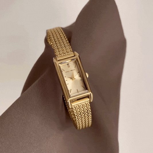 Deco Edge: Gold Rectangular Dial Watch with Gold Stainless Steel Bracelet