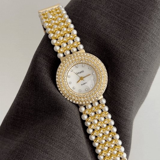 Feminine Opulence: White Round Dial with Pearl-Inlaid Gold Diamond Bracelet
