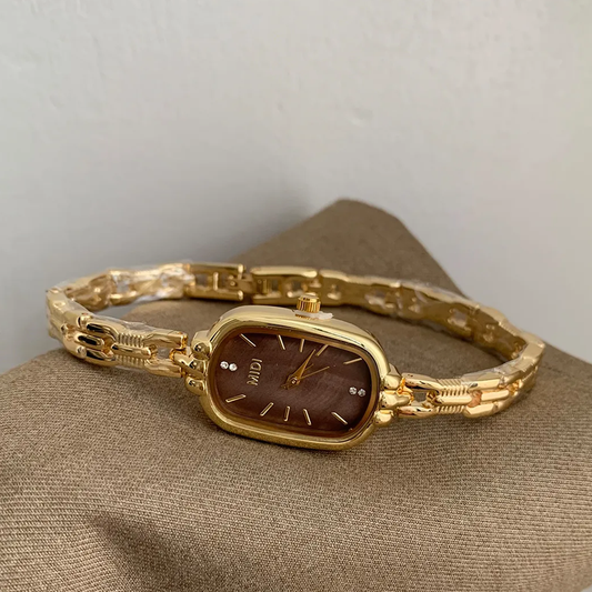 Golden Elegance Timepiece: Oval Coffee Dial Watch