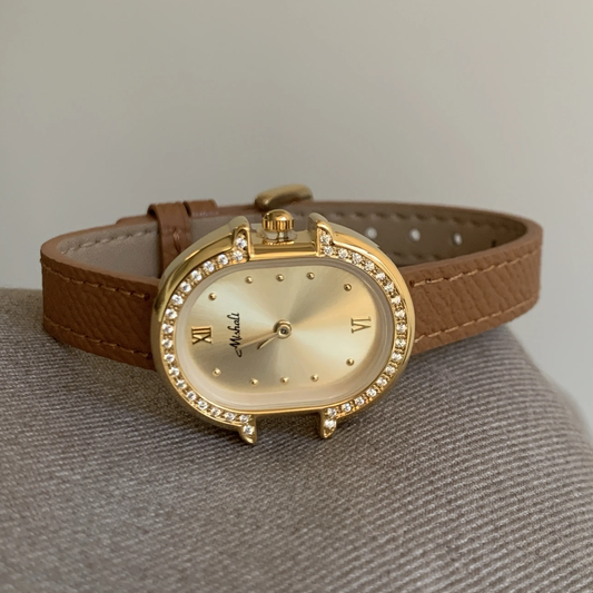 Golden Elegance Timespiece: Brown Leather Oval Quartz Watch