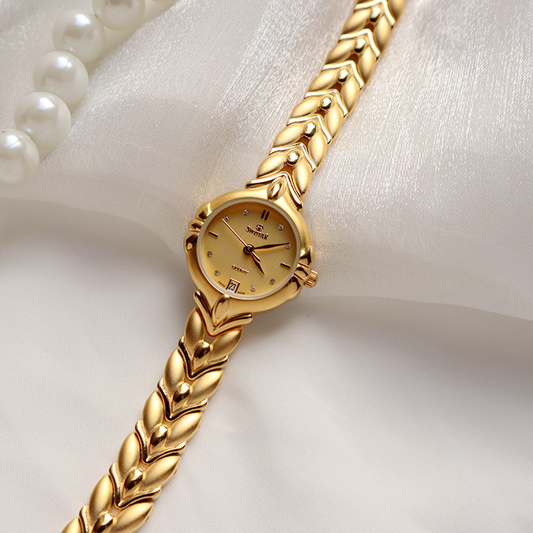 Golden Ivy – Sculpted Leaf-Link Timepiece